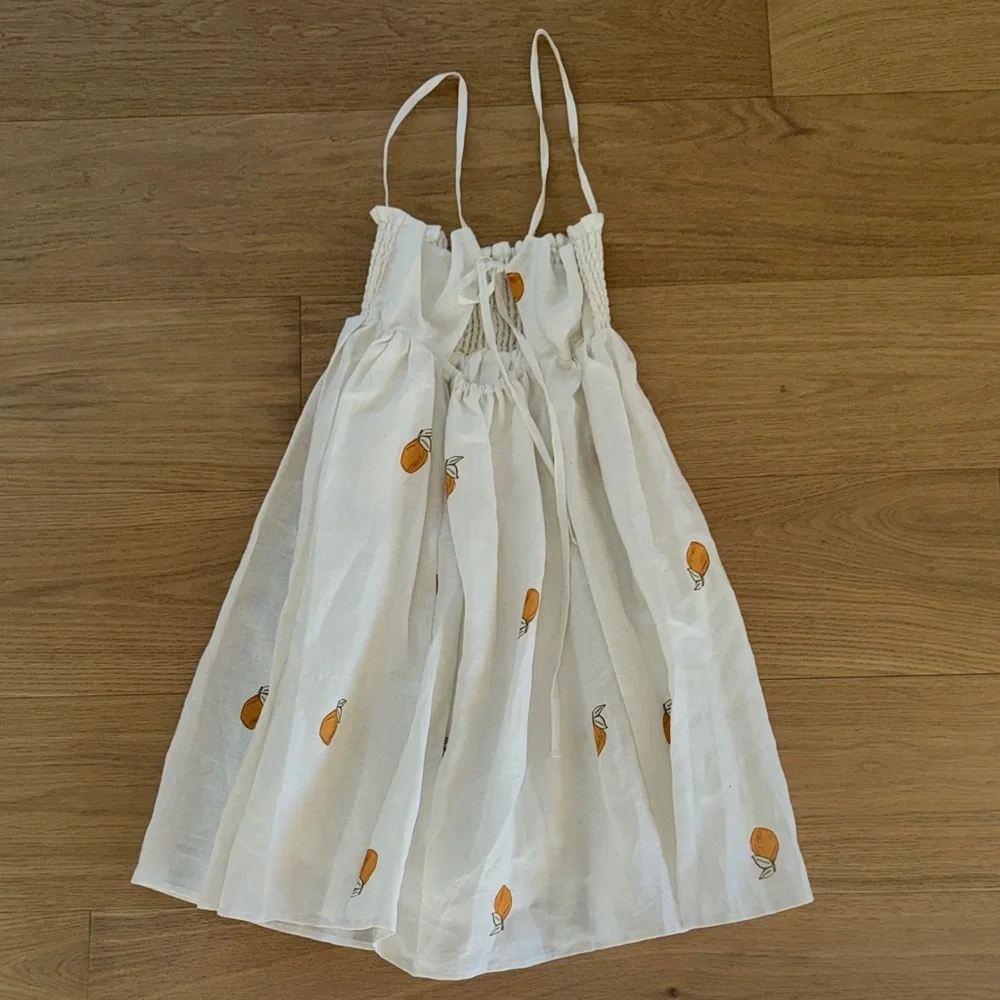 White Smocked Sundress with Orange Fruit Print - Picture 2 of 7